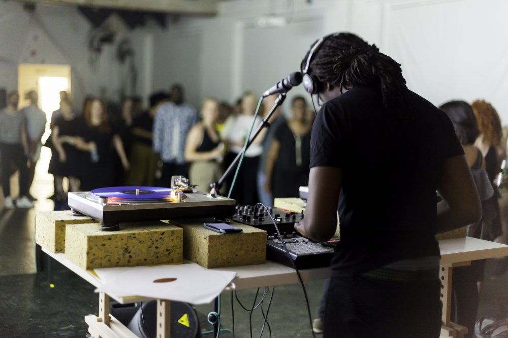 Larry Achiampong performing at <i>All Of Us Have A Sense Of Rhythm: An Evening of Live Music</i> at DRAF, 2015. Photo: Dan Weill