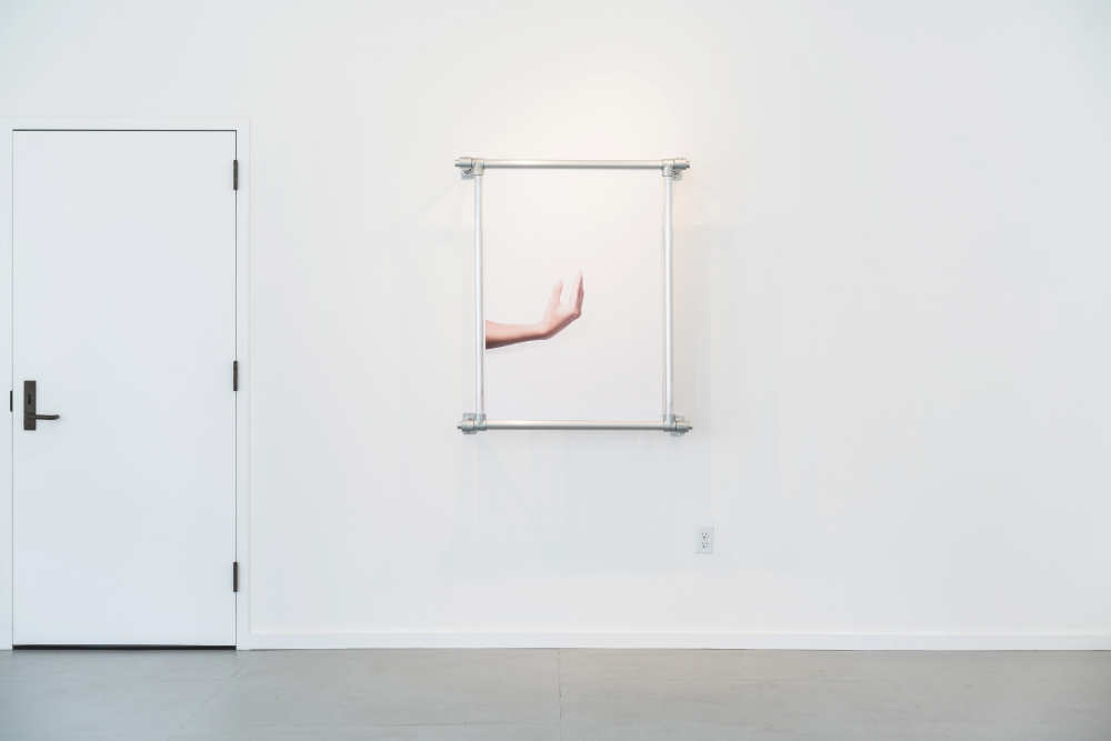 Débora Delmar, 'Hired Hands (Estēe Lauder, Modern Muse) banner' (2017) Installation view. Courtesy the artist, Interface Gallery + Slide Space 123, Oakland.